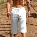 Close-up of white breathable linen-cotton 3/4 shorts for men showing fabric texture - White