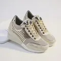 Detailed view of gold wedge sneakers featuring mesh side panels and metallic accents. - 35 / Khaki