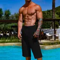 Detailed view of men's black linen cropped pants for casual summer wear - S / Bottoms / Black