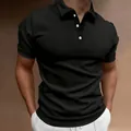 Detailed view of a slim fit black polo shirt for men featuring classic white buttons. - Black