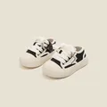 Baskets de marche en toile noir et blanc pour bébés avec semelles épaisses de couleur crème - Noir