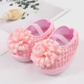 Nahaufnahme von rosa Baby-Prinzessinenschuhen mit großer Schleife und weicher Sohle. - Größe 12 (Innen 11cm) / Rosa