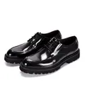 Side view showing the high-gloss finish and thick soles of these black Derby shoes. - 38 / Black