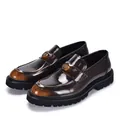 Detailed view of brown patent leather loafers with a glossy finish and metal crest - 38 / Tan Gold