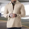 Detailed shot of a men's khaki long-sleeve waffle knit polo shirt with zipper collar - Khaki