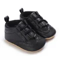 Detailed view of black textured soft-sole baby walking sneakers for 0-1 years old. - 11cm/64 / Black