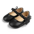 Schwarze Baby-Mary-Janes aus PU-Leder mit geflochtenem Riemen und Schleife für Kleinkinder - Schwarz