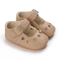 Detailed view of beige baby princess shoes with heart cutouts and non-slip rubber soles - Apricot