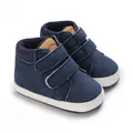 Detailansicht der dunkelblauen Baby-Lauflernschuhe mit Klettverschluss und weißer Sohle - Dunkelblau