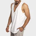 Detailed close-up of men's loose white cotton tank top featuring a deep V-neck design - S / Tops / White