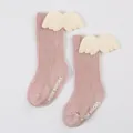 Close-up of pink ribbed baby socks with cute plush wings and anti-slip sole grips - S / Dusty Pink (DB032)
