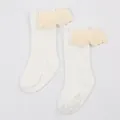 Detailed view of cream baby ribbed mid-calf socks with cute 3D plush wing decorations. - S / White (DB032)