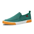 Lässige grüne Canvas-Slipper für Herren mit einer auffälligen orange-weißen Sohle - 38 / Dunkelgrün