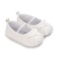 Elegant white quilted baby girl flat shoes featuring a decorative ribbon bow design - White