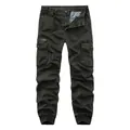 Front view of men's dark olive cargo jogger pants with multi-pockets and drawstring. - 29 / Bottoms / Army Green