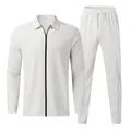Close-up of men's white waffle knit tracksuit with zip-up polo top and joggers - S / Top And Bottom / White