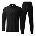 Detailed view of men's black waffle knit tracksuit with long-sleeve zipper polo and joggers - S / Top And Bottom / Black