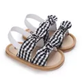 Sandalias de bebé niña con cuadros vichy en blanco y negro, lazos dobles y tira elástica - Gingham Negro