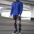 Men's blue waffle knit jacket with zipper and collar in an urban setting - Sapphire Blue