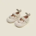 Cream quilted baby shoes with cartoon bunny face and heart-shaped heel detail - Beige