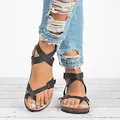 Sandalias romanas negras para mujer con lazo en el dedo y hebillas - Negro