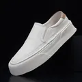 Minimalist white soft cowhide leather slip-on loafers with thick platform sole for men. - Off White