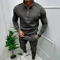 Close-up view of a premium men's dark grey half-zip fleece tracksuit set with joggers - Dark Gray