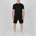 Professional full body view of men's black solid color short sleeve T-shirt and shorts set - M / Top And Bottom / Black