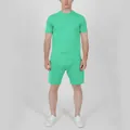 Detail view of men's summer mint green short sleeve t-shirt and shorts set on model - Lake Blue