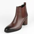 Detail view of brown men's Chelsea boots with burnished toe and block heel. - Dark Brown