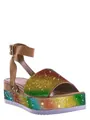 Close-up of vibrant rainbow rhinestone detailing on platform wedge sandals - Colorful