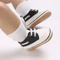 Stylish black and white lace-up infant walking shoes for babies aged zero to one year - Black and White Patchwork (E-130)