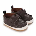 Classic dark brown baby boy pre-walking shoes with woven texture and soft white sole - Coffee