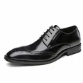 Classic black leather Brogue dress shoes with wingtip detailing and lace-up closure - 38 / Black