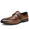 Classic brown leather monk strap dress shoe with metal buckle and rounded toe design. - 39 / Brushed Brown