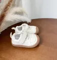 Cream white toddler walking shoes featuring soft rubber soles and velcro straps for baby - Size 17 (11.5CM Inner) / Beige