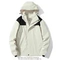Modern 2025 unisex waterproof windbreaker jacket featuring stylish black color-block panels - XS / Tops / Ivory