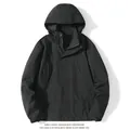 Minimalist black hooded windbreaker jacket with waterproof fabric for men and women - XS / Tops / Black
