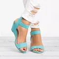 Stylish turquoise suede wedge sandals with ankle strap for summer fashion - Blue