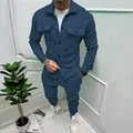 Close-up detail of men's navy blue suede slim fit two-piece jacket and pants set. - Navy Blue