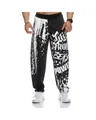 Detail of men's quick-dry fitness joggers featuring bold STRONG and BEAST graphic prints. - M / Bottoms / Black
