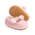 Detail shot of pink velvet baby princess shoes with bow and anti-slip sole pattern. - Insole Length 11cm / Pink