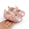 Detailed view of pink metallic baby princess shoes with soft tulle bow and rubber sole - Insole Length 11cm / Pink