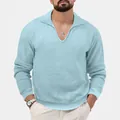 Detailed view of men's light blue waffle knit polo shirt with V-neck and lapel collar - Sky Blue