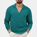 Close-up of men's waffle knit long sleeve polo shirt in teal with a V-neck collar - S / Tops / Denim Blue