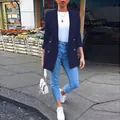 Women's stylish navy blue mid-length blazer jacket paired with denim street jeans. - S / Tops / Navy Blue