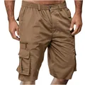 Close-up of men's brown cargo shorts with multiple utility pockets and elastic waist. - M / Bottoms / Camel
