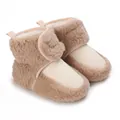 Close-up view of cozy infant fleece winter boots with non-slip soft soles and hook loop - Apricot