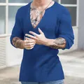 Close-up view of a royal blue men's deep V-neck slim fit ribbed long sleeve knit shirt - S / Tops / Sapphire Blue