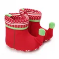 Macro detail of red Christmas elf-style infant snow boots with soft green pom-poms - 11cm / Red (B138)